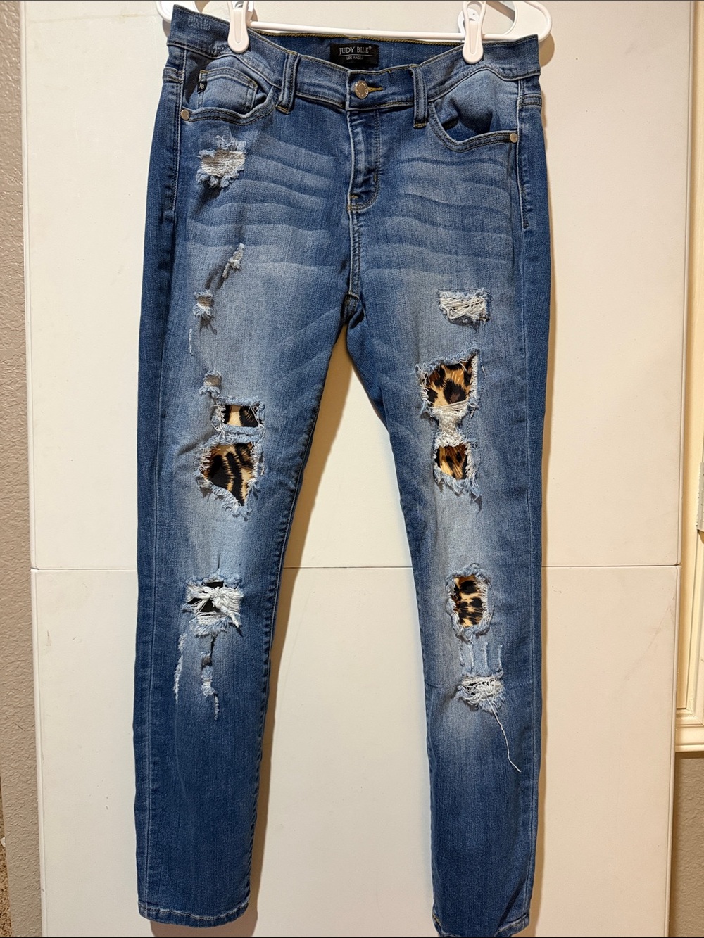 Judy Blue Distressed Skinny Jeans with Leopard Underlay - Blue